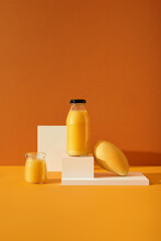 Delicious Juicy Smoothie With Mango Fruit On Yellow Background