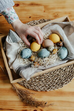 Container With Creatively Decorated Colorful Easter Eggs