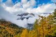 © Yaroslav Danylchenko/Stocksy - Cloudy mountain landscape in the Swiss Alps Switzerland.
