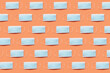 © Yaroslav Danylchenko/Stocksy - Horizontal pattern from antibacterial masks.
