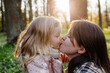 © Sergey Narevskih/Stocksy - Mother and daughter resting in park