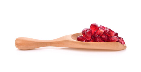 Wall Mural - Fruit pomegranate in wood scoop on white background