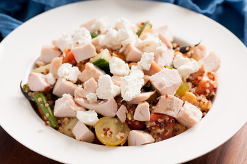 Poster - chickpea and quinoa salad with diced chicken and goat cheese