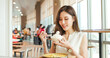 © ryanking999 - woman eat rice in restaurant