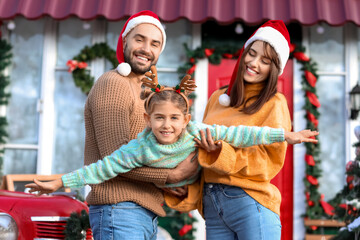 Poster - Happy family celebrating Christmas outdoors