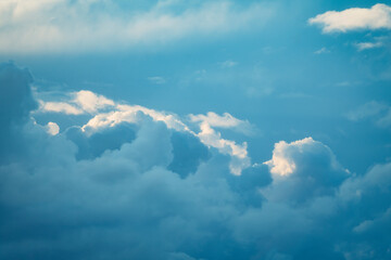 Wall Mural - thunderstorm cloud in the sky at sunset texture background.