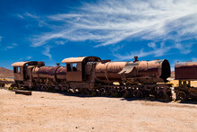 Old Rusty Locomotive Abandoned In The Train Cemetery Of Uyuni, Bolivia.