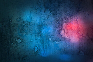 Wall Mural - Grunge dark color background. Texture concrete wall with bright blue or azure and pink light spots. Horizontal photo with neon for modern design