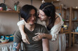 © shapovalphoto - Loving couple man and woman in pottery studio, dating in ceramics workshop