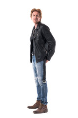 Side view of young handsome redhead man in stylish clothes with hands in back pockets looking back. Full body length isolated on white background. 