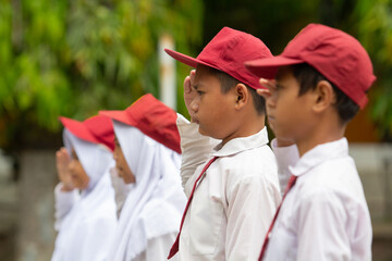 Flag honor is performed by the students of indonesia