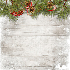 Wall Mural - Vintage christmas wood background with branches, holly and cones. Christmas greeting card with copy-space