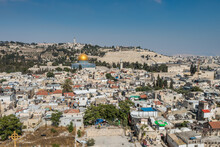 Aerial View Of Rooftops Of The Old City Of Islamic Quarter With Blue Sky Of Jerusalem, With Golden Dome Of Rock And Mount Of Olives,  View From The Lutheran Church Of The Redeemer.