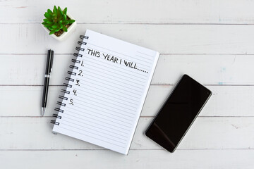 Wall Mural - This year i will text on note pad New Year concept