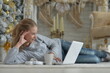 © aletia2011 - Girl with laptop on floor on Christmas