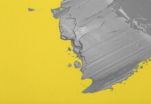 Colors Of The Year 2021 Ultimate Gray And Illuminating Background.  Ultimate Gray Paint On Yellow Illuminating Background.