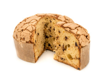 Panettone - Typical Christmas Milanese dessert with raisins and chocolate beads, dome-shaped cake with slice , isolated on white
