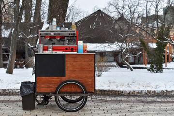 Coffee shop on wheels in a winter city park