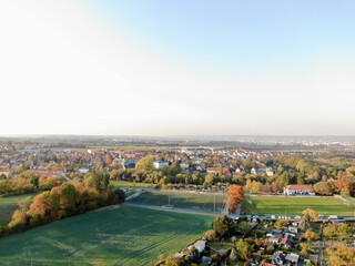 Sticker - Beautiful scenery of rural houses from the top. Panoramic view of the  park and football pitches