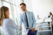 © BGStock72 - Young business partners making handshake in an office