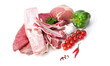 Assortmen of pork, fat, lamb, rib, beef meat with vegetables on white background.