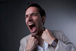 © Teodor Lazarev - Handsome corporate businessman yelling