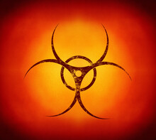 Red Biohazard Sign Over Yellow Background