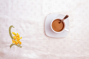 Canvas Print - Closeup shot of a cup of coffee on the table