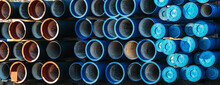 Plastic Pipe Background, Big PVC Pipes In Stack For Water And Drain Or Wastewater.