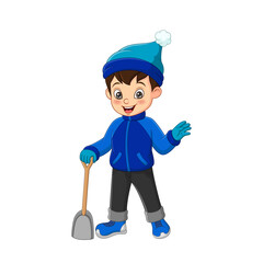 Wall Mural - Cute little boy in winter clothes with a shovel