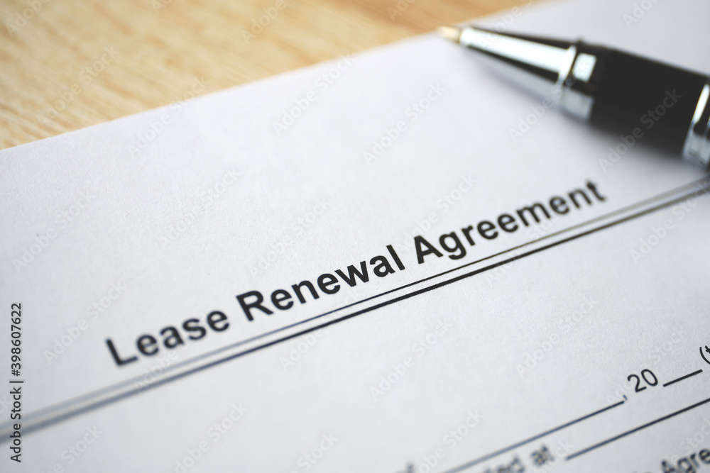 Legal document Lease Renewal Agreement on paper close up - obrazy, fototapety, plakaty 