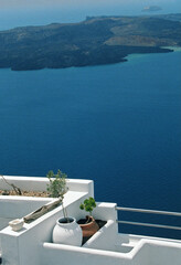  View of Santorini blue color sea and caldera  with white house roof and balcony in Santorini, Greece. 