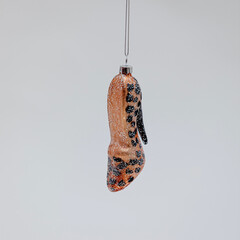 Sticker - Creative Christmas tree toy in the shape of a high-heeled shoe with a leopard print