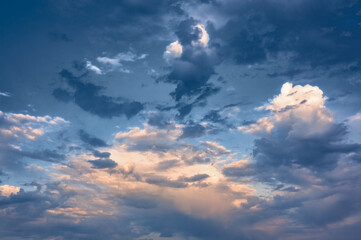 Blue summer sky with white cumulus clouds. Blue sky with clouds nature background.