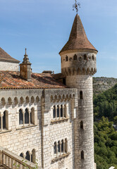 Wall Mural -  Stone walls of historic Basilica of St-Sauveur blend into the cliff in Rocamadour, France