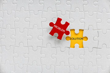 Wall Mural - Top view of a jigsaw puzzle written with Problem and Solution.
