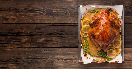 Wall Mural - Christmas or Thanksgiving duck baked with spices in the oven. top view