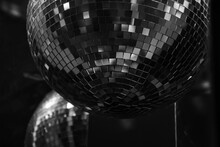 Mirror Disco Ball Holiday Decoration. Glow And Reflection. Retro Festive Background. Nightlife Concept. Black White Photography. Selective Focus.