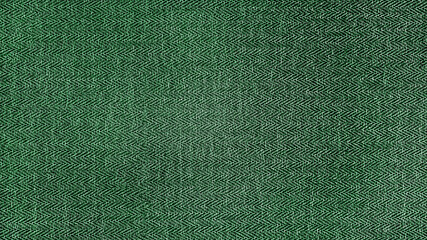 green herringbone tweed pattern, wool fabric background texture. interior material background. illumination background.