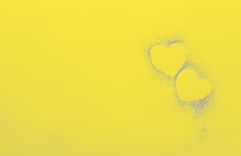Yellow Background With Hearts Of Gray Sequins. Copy Space.