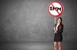 © ra2 studio - Young business person holdig traffic sign with SMM abbreviation, technology solution concept