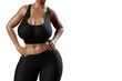 © PixlMakr - Young slim woman with big breasts in black sportswear