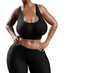 © PixlMakr - Young slim woman with big breasts in black sportswear