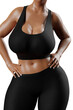 © PixlMakr - Young slim woman with big breasts in black sportswear