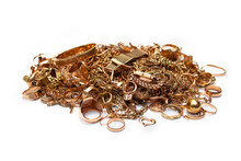 Scrap Gold Jewelry. Pile Of Old Used Gold Jewelry On White Background.