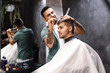 © Pixel-Shot - Professional hairdresser working with client in barbershop
