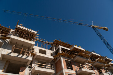 Aufkleber - Construction of a building with a remotely controlled unmanned crane