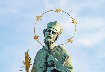 Wall Mural - The holy Nepomuk sculpture at Prague Charles Bridge, Czech Republic