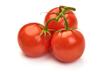 Ripe fresh tomatoes, close-up, isolated on white background