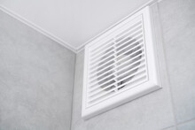 Home Vent Grille. Forced Ventilation In A Wall Under The Ceiling.